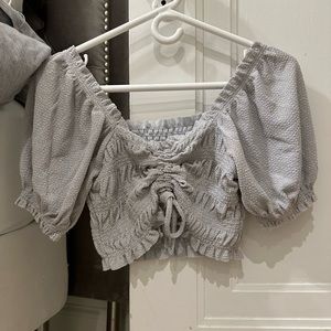 Sparkly silver puffed sleeve crop top from Urban - CAN BE WORN MULTIPLE WAYS